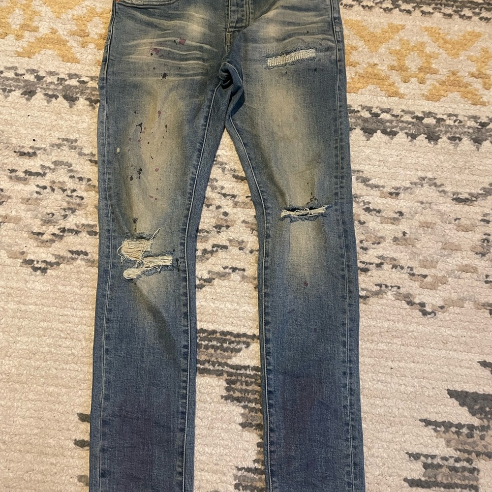 Blue Distressed Jeans with Faded Details